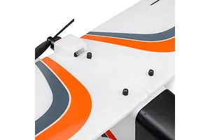 Close-up of the HobbyZone AeroScout S 2 RC plane showing the wing mounting screws, motor mount, and propeller against a white background.