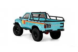 Rear three-quarter studio view of the RGT Pioneer V2 Pro 1/10 scale RC rock crawler truck in light blue with black roll bar and retro stripes.