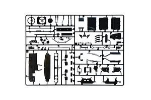 A black plastic model kit sprue containing various automotive parts against a plain white background.
