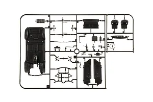 Black plastic model kit parts sprue featuring interior components, chassis, and seats on a white background.