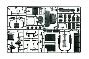 Black plastic model kit sprue containing various truck parts such as chassis components, suspension, and tanks.
