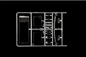 Clear plastic model sprue featuring windows and transparent parts for the Italeri 1/24 DAF XF 95 truck kit against a black background.