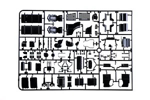 Black plastic model kit parts sprue featuring various interior and chassis components against a white background.