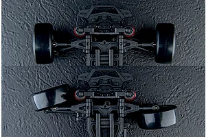 Top-down comparison showing front suspension steering angle on an RC car chassis against a dark textured background.