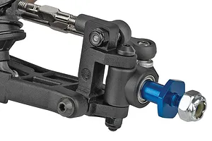 Close-up studio shot of an RC car front steering knuckle, suspension arm, turnbuckle, and blue wheel hex.