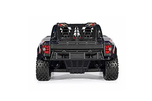 Rear view of the ARRMA MOJAVE 6S RC short course truck showing rear bumper, taillights, roll cage, and chunky tread tires against a white background.