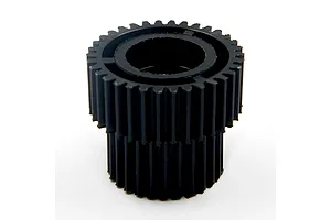 Yeah Racing black plastic dual gear component viewed from a high angle against a plain white background.