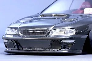 Close-up front view of the Pandora RC Subaru Impreza 22B STi 7800 body shell showing the hood scoop, headlights, and front bumper.