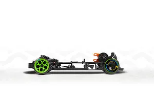 Side view of the black RC drift car chassis with bright green wheels and orange motor mount on a white studio background.