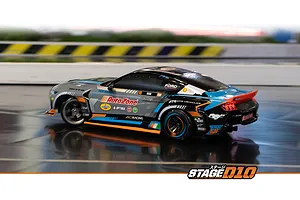 HPI Stage-D10 Ford Mustang GT Spec-5 FD RC drift car driving on an indoor track with racing livery.