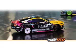 HPI Stage-D10 Ford Mustang GT Spec-5 RC drift car in action on a smooth track, featuring a custom black, yellow, and pink livery with Pennzoil branding.