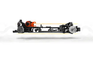Side view of the black RC drift car chassis with an orange motor mount and detailed brake discs on a white background.
