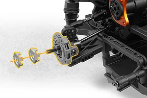 Close up of an RC drift car rear axle assembly showing the brake disc hub, drive shaft, and exploded wheel hex components.