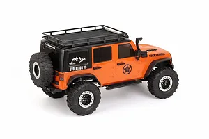 Studio shot of the RGT Rock Cruiser Evolution V3 orange 1/10 scale RC rock crawler viewed from the rear three-quarter angle.