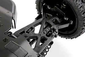 Close-up studio view of the black plastic suspension arm, wheel, and shock absorber on an RC car.
