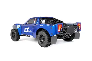 Rear-three-quarter studio view of the Rovan ELT320S V2 blue electric short course RC truck.