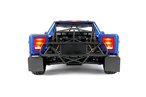 Rear view of the Rovan ELT320S V2 RC short course truck showing its blue body, internal roll cage, illuminated tail lights, and mud flaps against a white background.