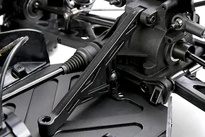 Close-up view of the chassis, differential housing, and suspension components on the Rovan ELT320S V2 RC short course truck.