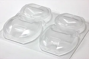 Unpainted clear polycarbonate over fender set sheet on a white background.