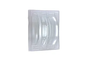 Unpainted clear polycarbonate RC GT wing set parts on a molded sheet against a white background.