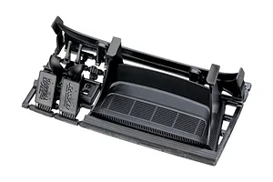 Black plastic RC car body accessory parts tree including a rear wing and interior details on a white background.
