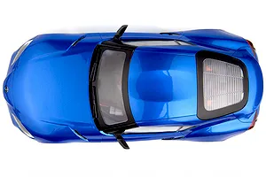 Top-down studio view of the metallic blue HPI Stage D24 Toyota Supra GR RC car, highlighting the body shape and windows.