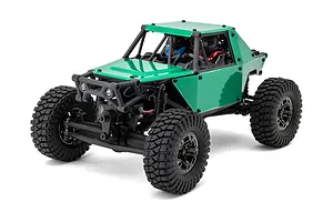 Studio product shot of Maverick Scout-24 1/24 scale electric 4WD RC rock crawler in green with black roll cage and large lugged tires.