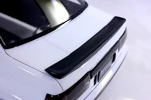 Close-up rear view of the Pandora RC Toyota AE86 Sprinter Trueno 2DR body shell featuring a black rear spoiler.