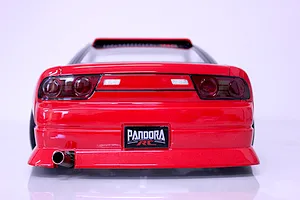Rear view of painted red Pandora RC 180SX drift car body featuring a Pandora RC license plate and exhaust pipe.