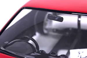 Close-up of the interior and windshield of the Pandora RC S15 Silvia BN Sports body shell, showing a steering wheel and rear-view mirror.