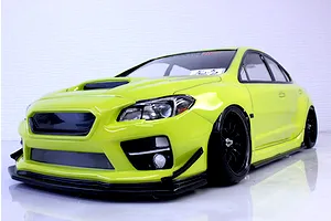 A painted fluorescent yellow Subaru WRX STI RC drift body shell mounted on a chassis with black wheels against a white background.