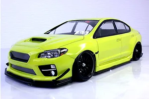 Fluorescent yellow Subaru WRX STI RC drift car body shell mounted on a chassis with black multi-spoke wheels.