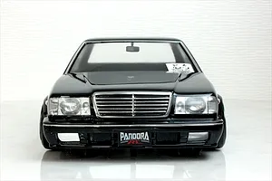 Front view of a black Y31 Cedric Sedan RC body shell by Pandora RC with chrome grille and bumpers.