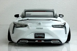 Rear view of a Pandora RC Lexus LC 7800 body shell painted white with black roof, custom decals, and detailed tail lights.