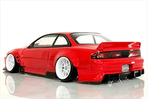 Rear three-quarter view of a painted red RC drift car body shell representing an S14 Silvia with white deep-dish wheels, spoiler, and diffuser against a white background.