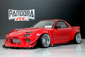 Red Pandora RC Mazda RX-7 FD3S BN Sports drift car body shell on a reflective surface with a branded backdrop.