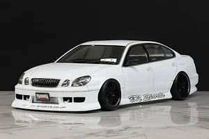White Toyota Aristo JZS161 RC drift car body shell with BN Sports styling on a reflective surface.