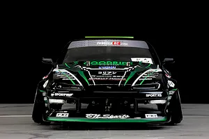 Front view of a Pandora RC S14 Silvia RC drift car body featuring black and green livery with sponsor decals.