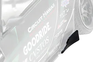 Close-up of a Pandora RC S14 Silvia RC drift car body showing side sponsor decals and a black side skirt winglet.