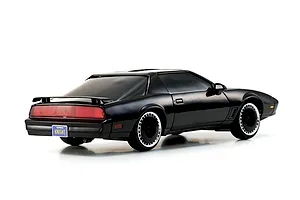Rear three-quarter view of the Kyosho Mini-Z Knight Rider RC car showcasing its black body, turbine wheels, and California KNIGHT license plate on a white background.