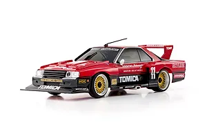 Kyosho First Mini-Z 1982 Nissan Super Silhouette RC car in red and black with Tomica branding, shot against a white background.