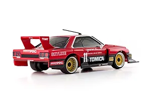 Rear-three-quarter studio view of the Kyosho First Mini-Z 1982 Nissan Super Silhouette RC car in red with black trim and gold mesh wheels.