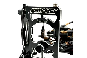 RC Maker adjustable caster tool mounted and in use on an RC car suspension against a white background.