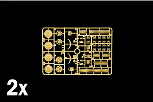 Tan plastic model sprue featuring wheels, track links, and small mechanical components with a 2x indicator.