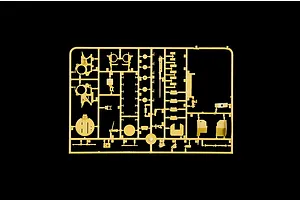 Tan plastic model kit sprue containing various unbuilt parts and components on a black background.