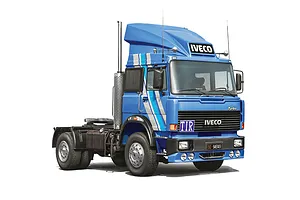 Studio photo of the completed blue IVECO Cow-Boy semi truck model kit against a white background.