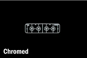 Chrome plated plastic model kit parts sprue containing four wheel rims against a black background with the word Chromed visible in the corner.
