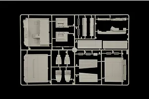 Grey plastic model parts sprue for Italeri Renault AE500 Magnum Semi Truck kit, featuring interior and cab components.