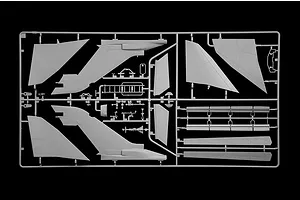 A grey plastic model kit sprue containing aircraft parts such as wings, tail sections, and smaller components on a black background.