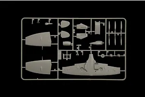 Grey plastic model kit sprue containing wings, propeller blades, and fuselage parts for the Italeri Spitfire.